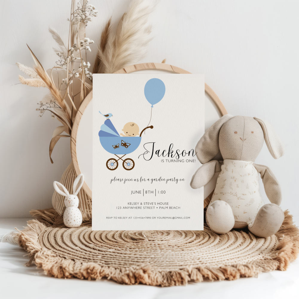 1st birthday party invitation for a girl. Baby in a blue pram with a blue balloon on white paper | Patti and Hank