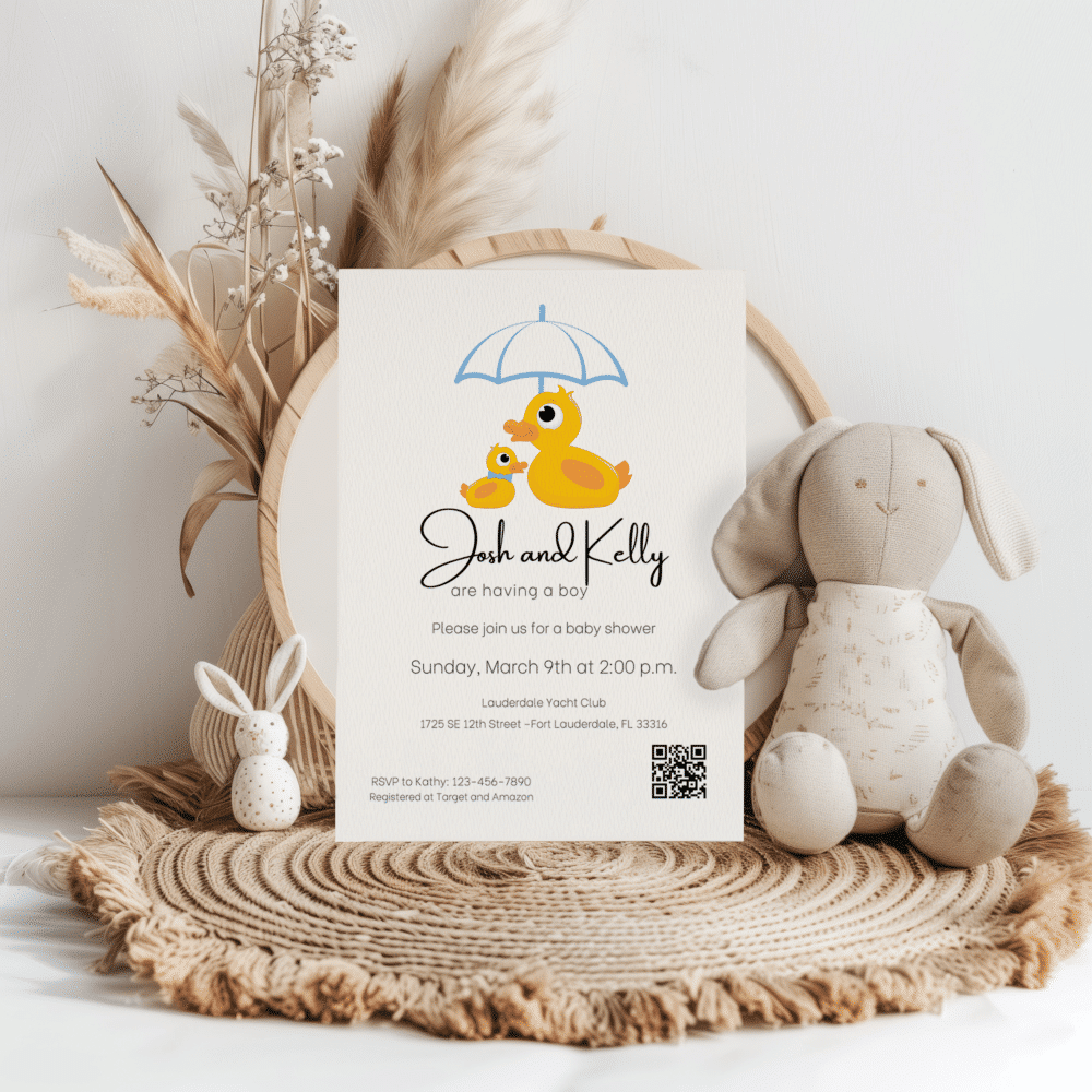 Baby shower invitation with a mother duck and a baby duck with a blue umbrella on white paper | Patti and Hank